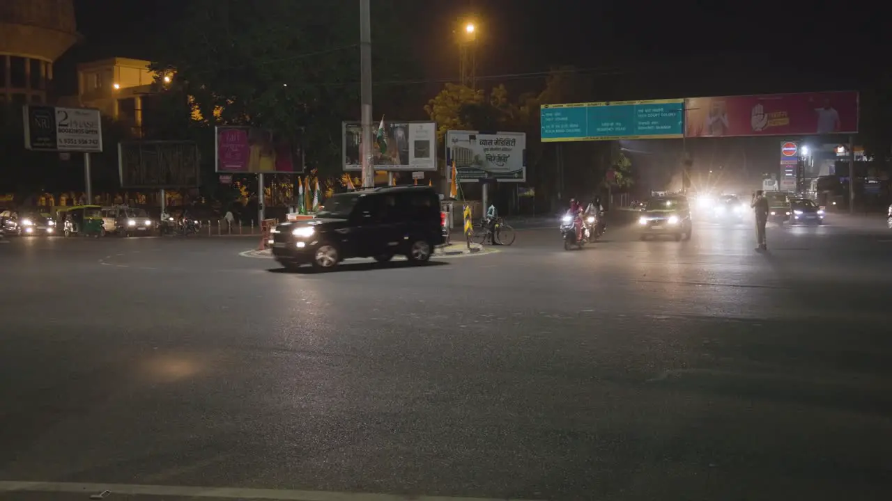 crowded city street traffic at traffic control signal from different angle