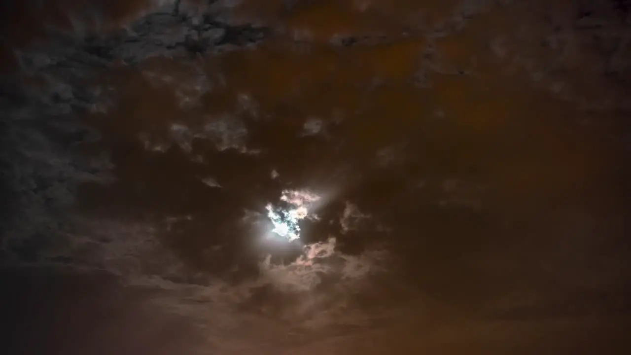 Amazing timelapse for a full moon set and clouds at night