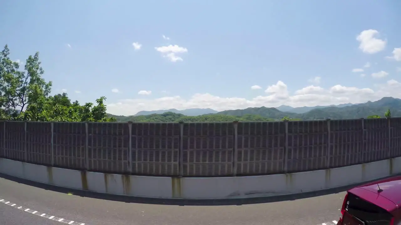 Bus tour with a go pro side view of the forest and town passing by