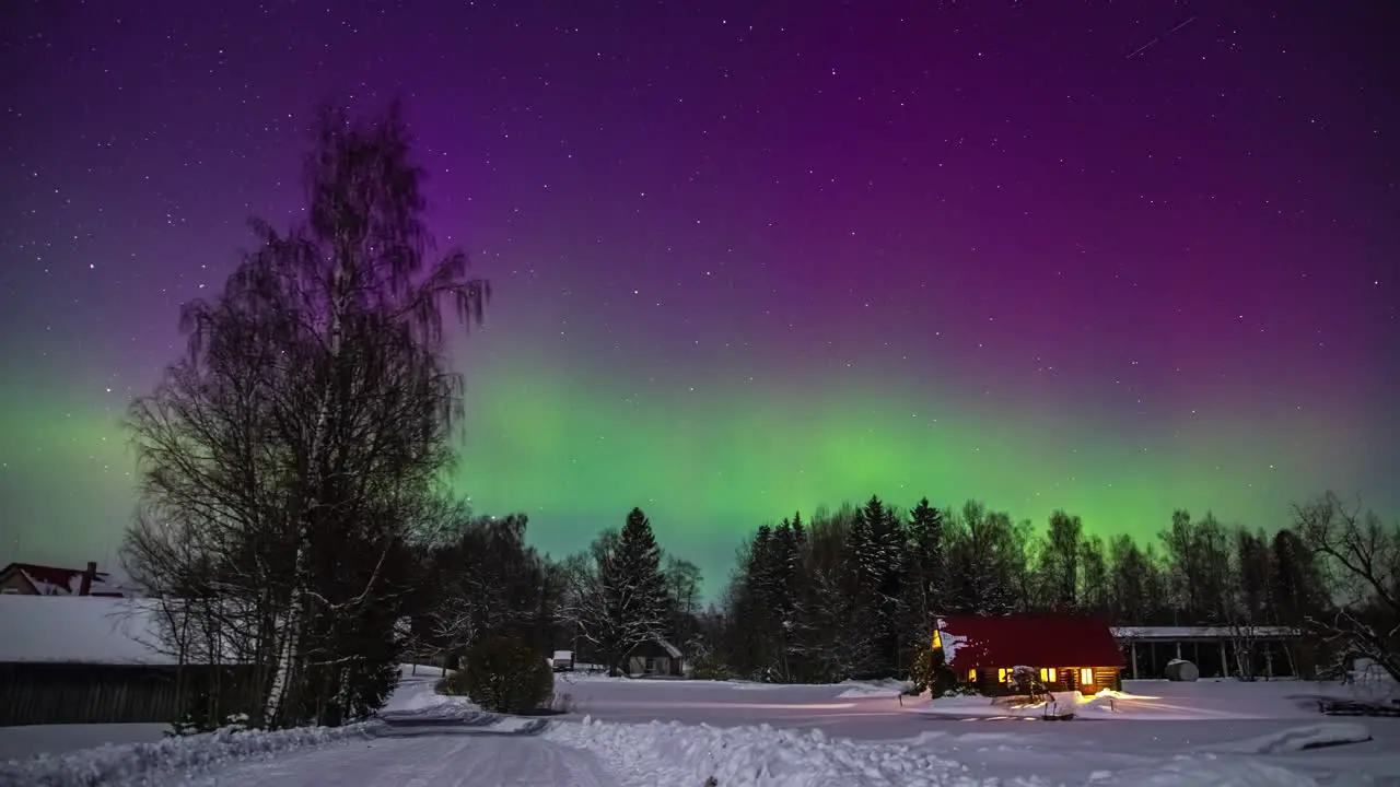 Time lapse shot of colorful electrically charged particles at night sky with colorful flashing lights during winter