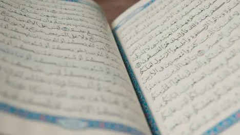 A Handheld Tracking Shot of the Quran 