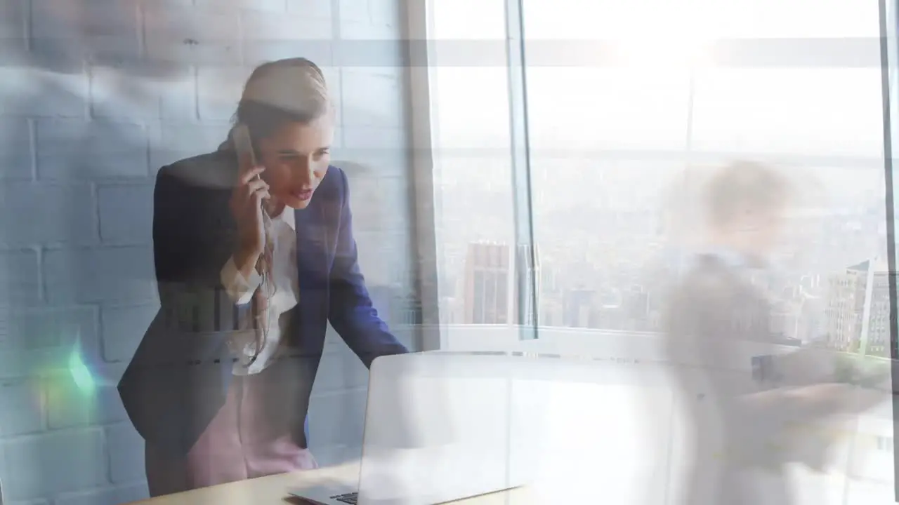 Animation of caucasian businesswoman talking on cellphone over time lapse of blurred people