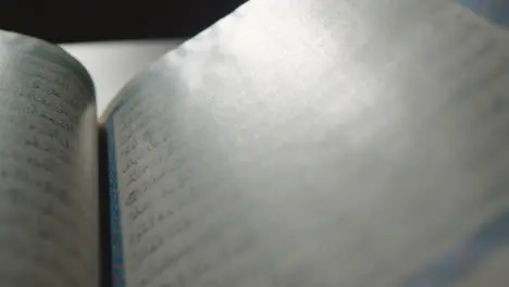 Handheld Shot of Quran Pages