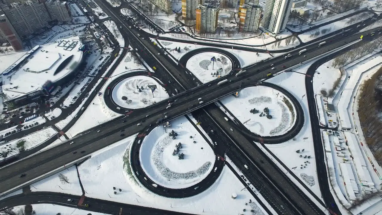 Car traffic freeway overpass at winter Aerial cars moving on highway junction