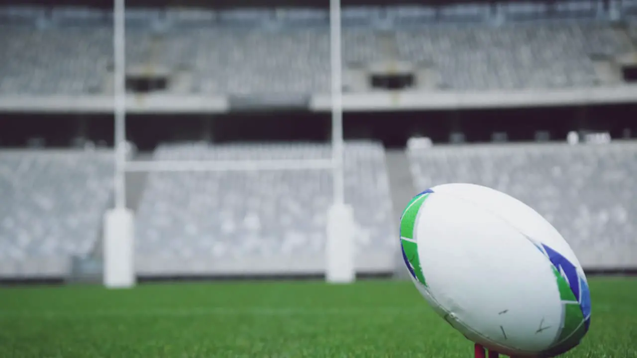 Rugby ball on a grass in the stadium 4k