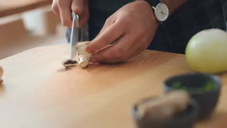 Chef mushroom and cooking food at a hotel