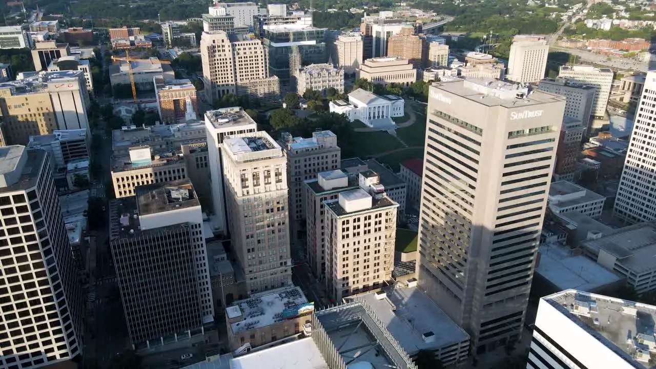 Downtown and Riverfront in Richmond Virginia | Aerial Flyover Panning Across | Summer 2021