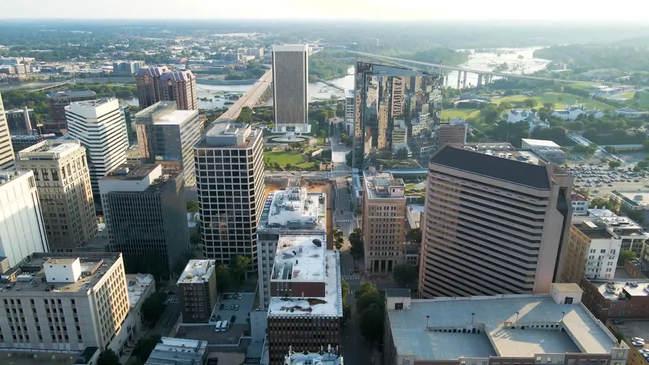 Downtown Buildings and James River in Richmond Virginia | Aerial View Panning Up | Summer 2021