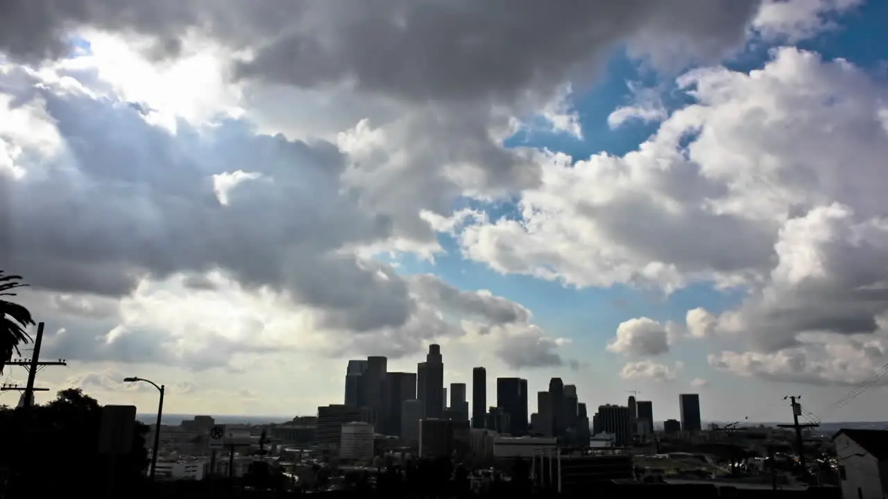 Time lapse of clouds passing dramatically over a city