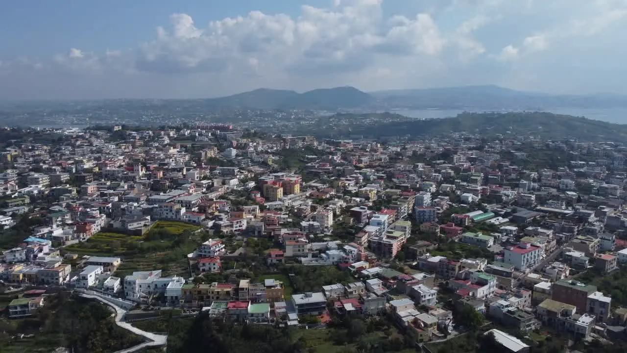 A small town on the hill filmed from the sky using a drone