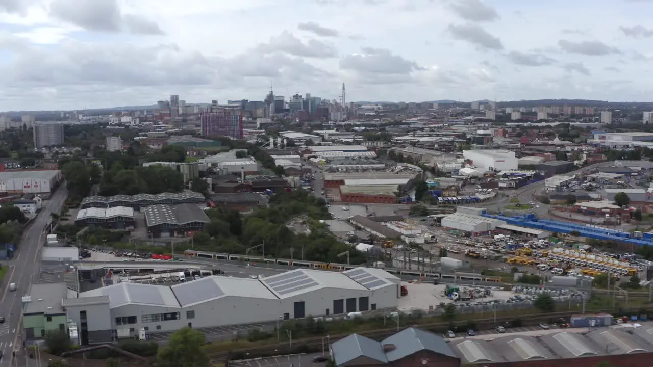 Drone Shot Tracking Train Through Industrial Estate 02