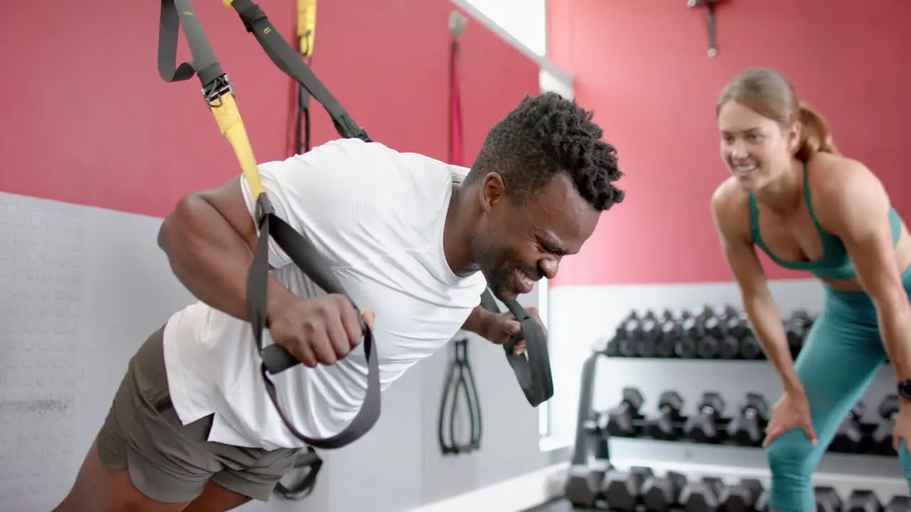 Fit African American man trains at the gym