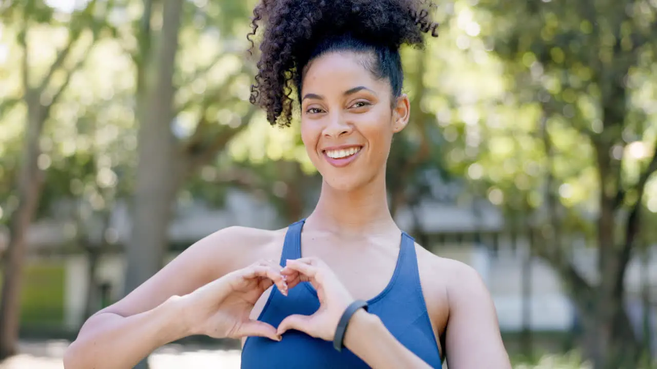 Portrait heart and hand gesture with a fitness