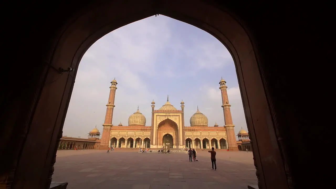 Reveal Shot of Jama Masjid Though an Archway