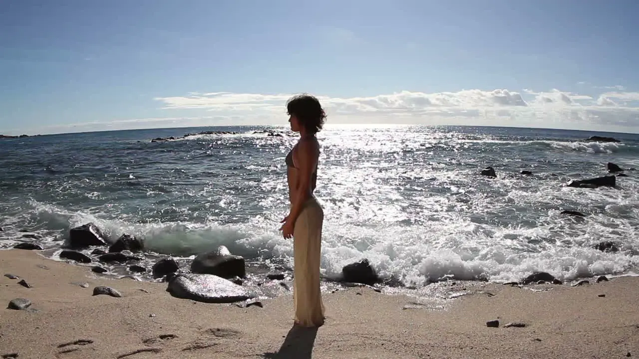 Woman Relaxing on Beach 0 90