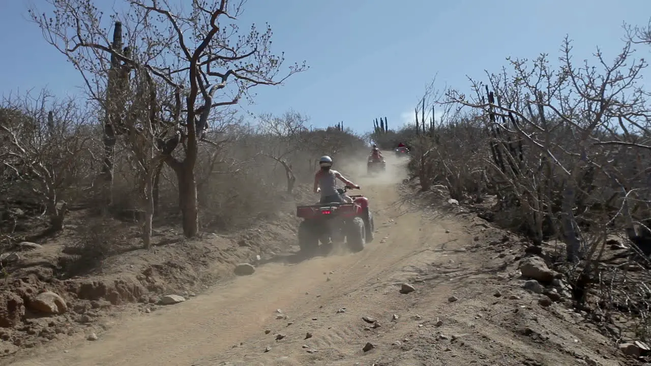 Quad Bikes on Dusty Track 000