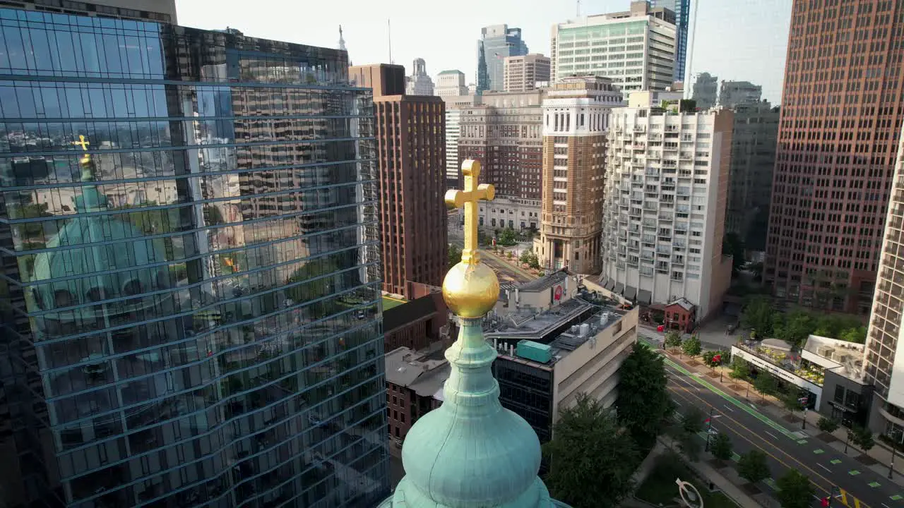 Catholic Basilica Philadelphia Crucifix on dome drone tight spin around with lens flare