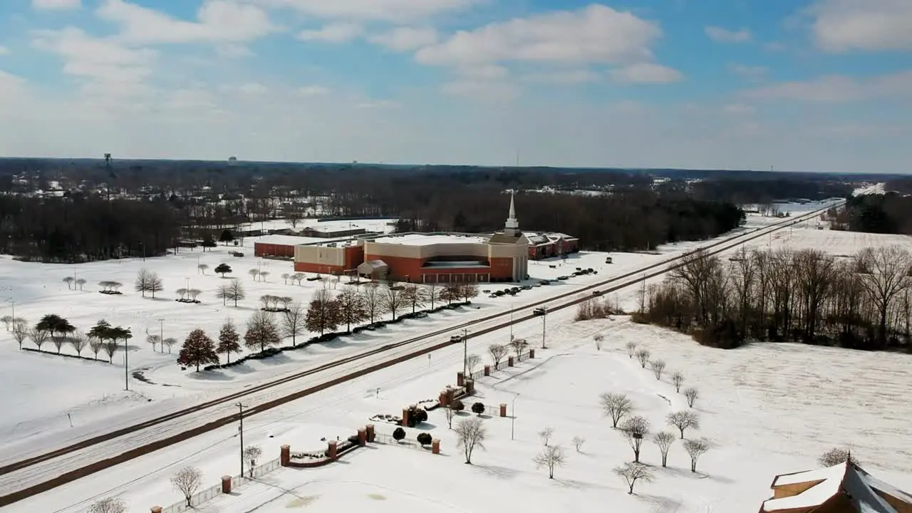 Church traffic in the snow from drone