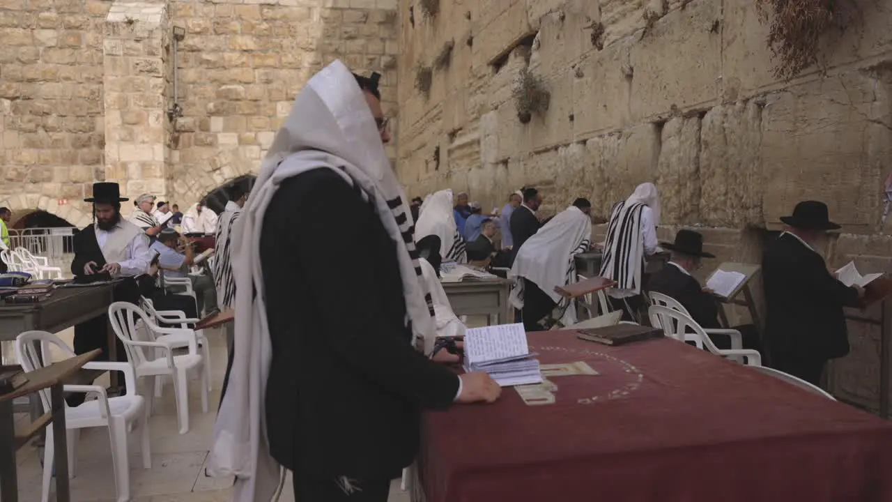 Jewish Men Swaying And Reading Torah