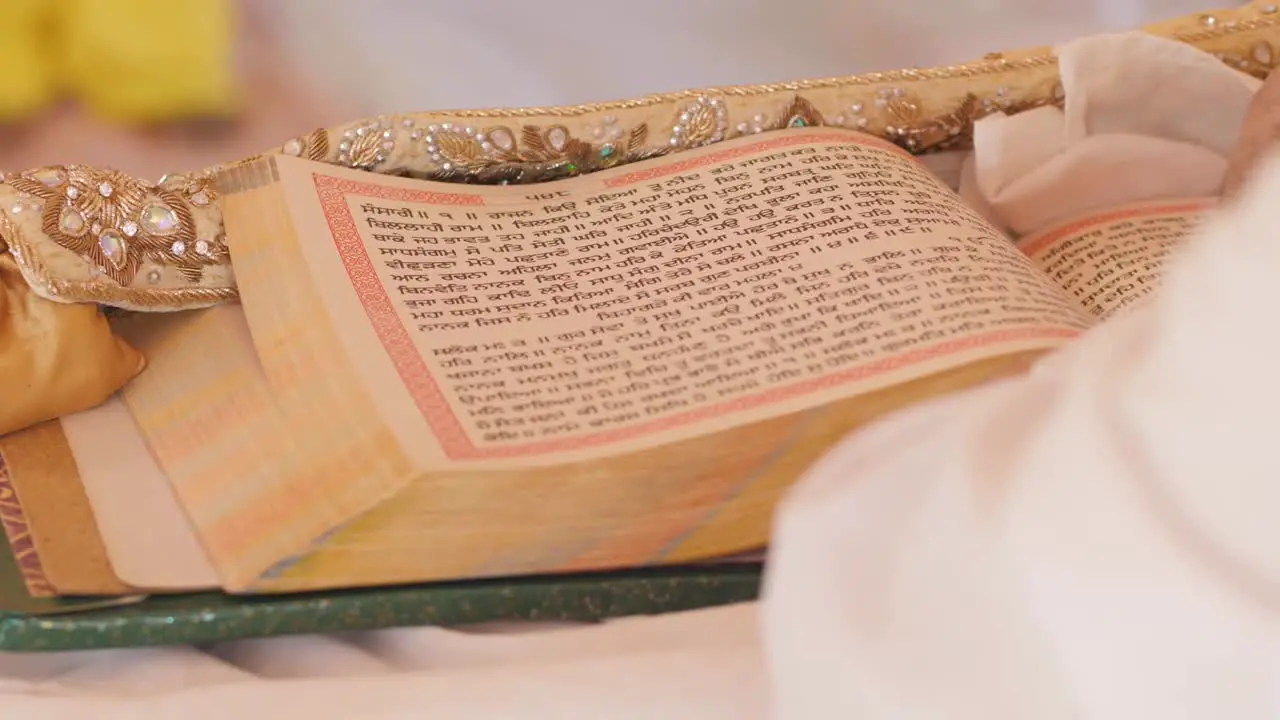 The pages of a Holy text at an Indian wedding