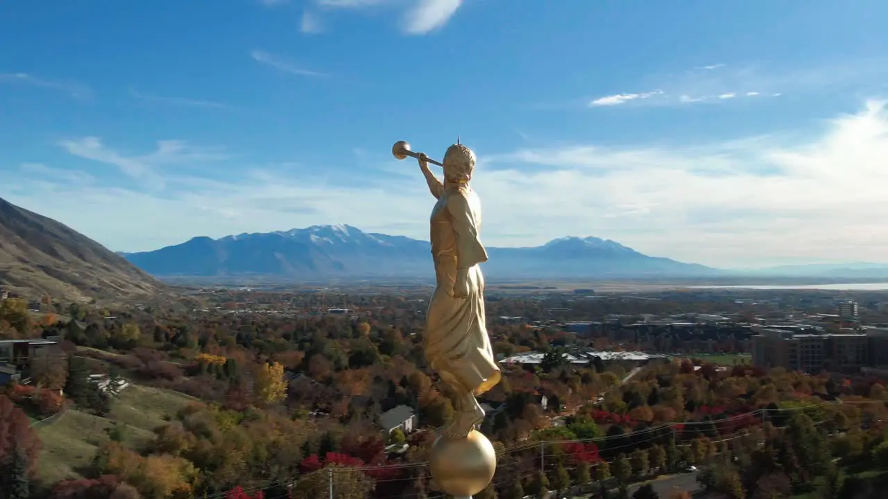 Angel Moroni Gold Statue with Trumpet on Provo LDS Mormon Temple Extremely Detailed Aerial Closeup