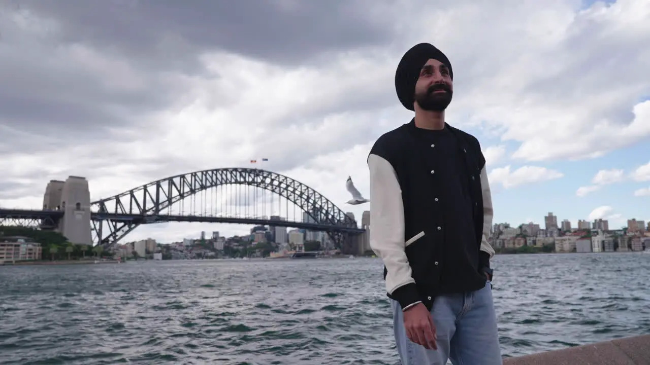 Bearded Punjabi Sikhi Man Smiling Near Sydney Harbour Bridge In New South Wales Australia