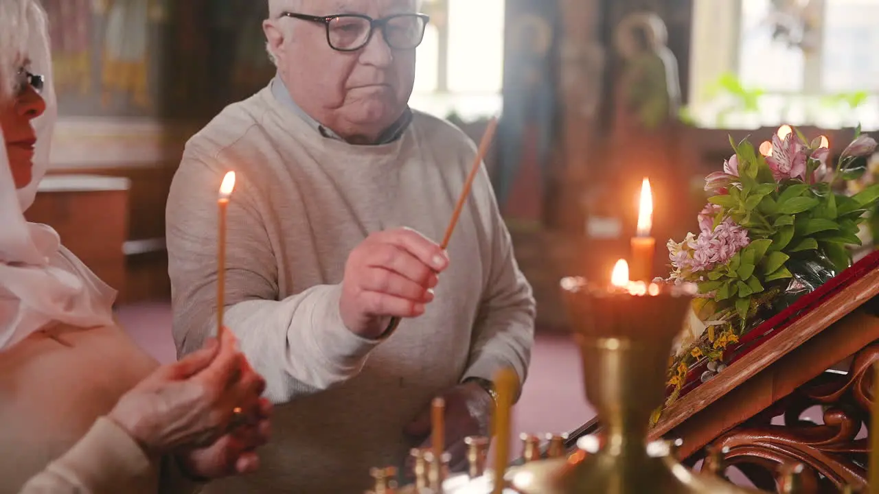 Old man and woman in church