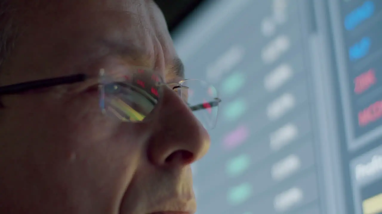 Closeup Of Pensive Data Engineer With Eyeglasses Looking At Digital Monitor