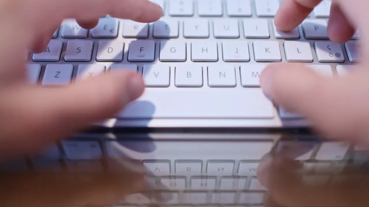 Male Office Worker Typing on Keyboard