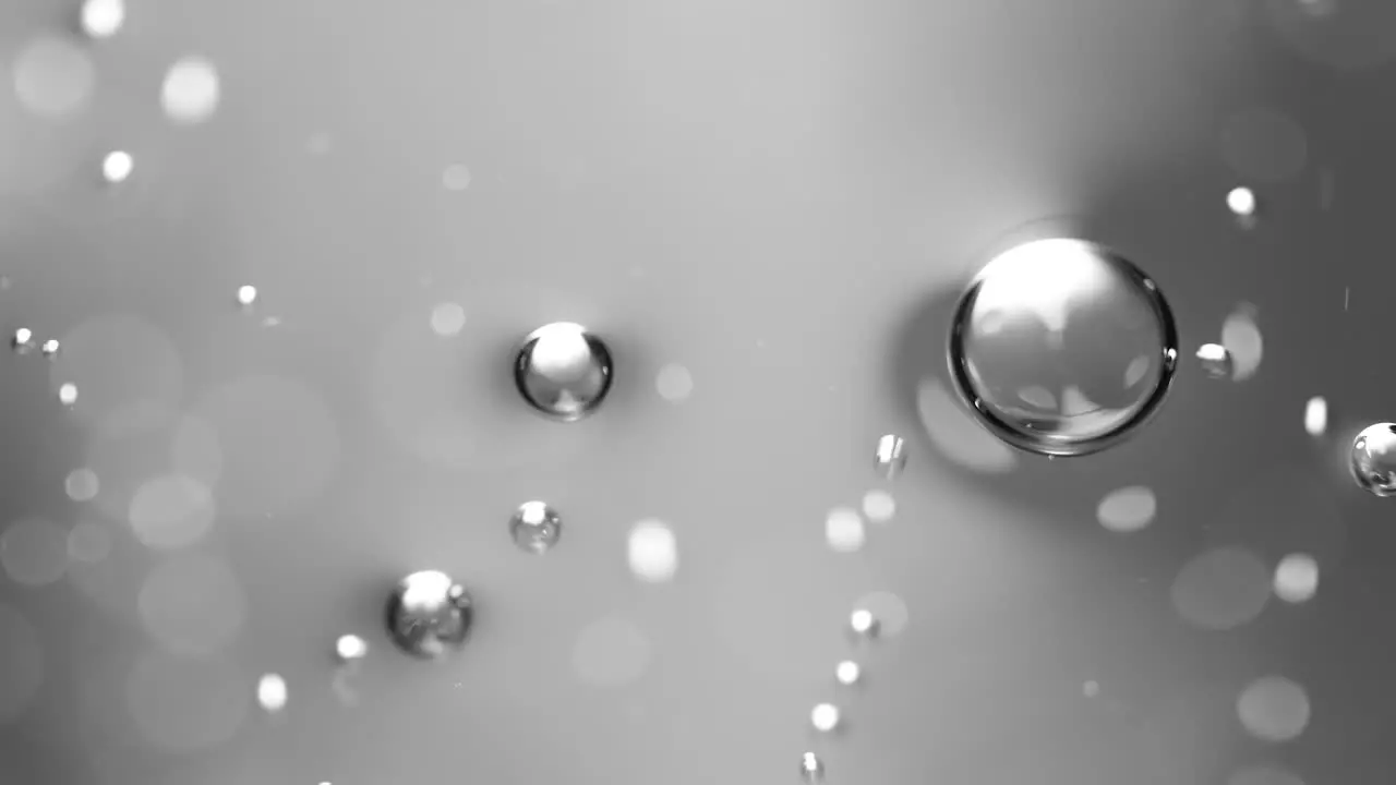 Abstract science or art background with silver bubbles rising