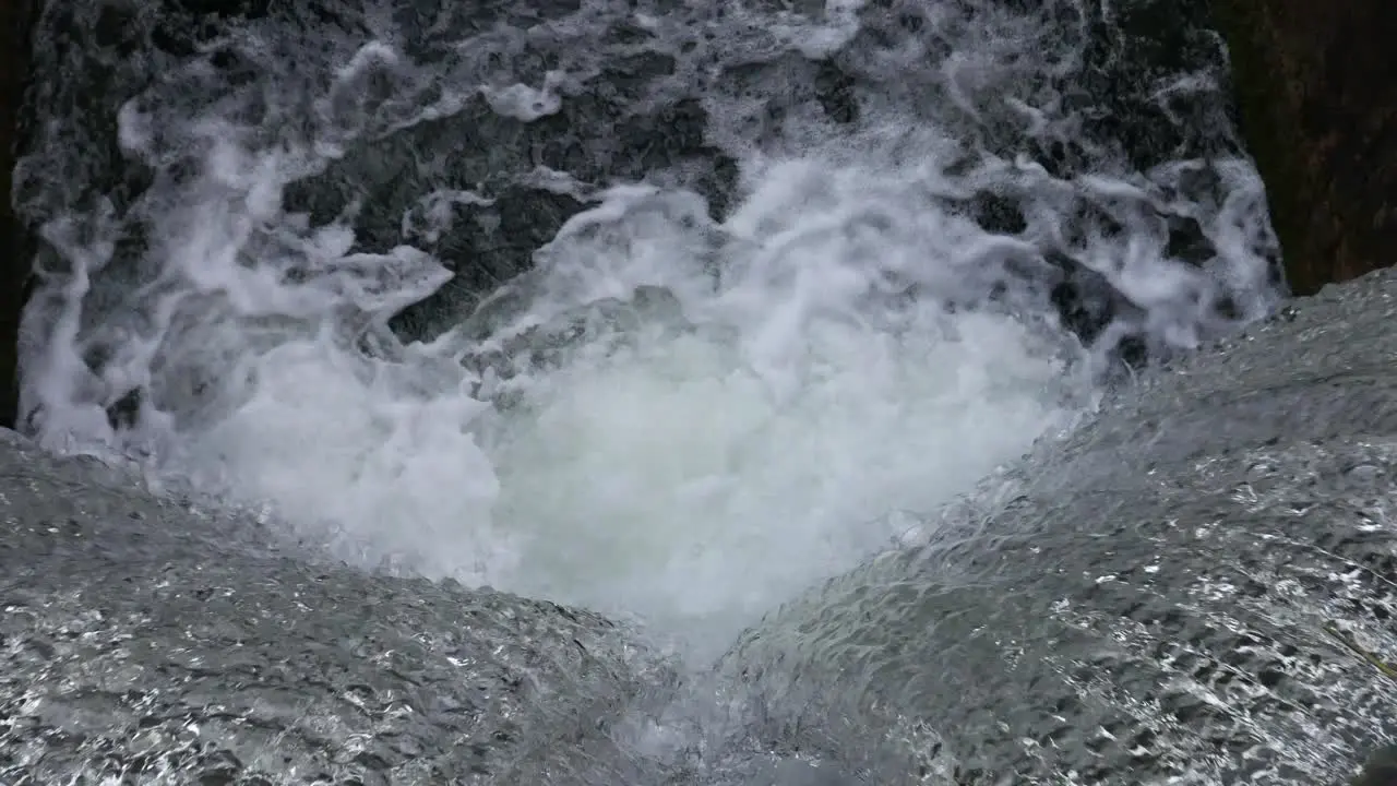 Flowing water through the old sluice gate making waterfall  Dublin grand canal Ireland