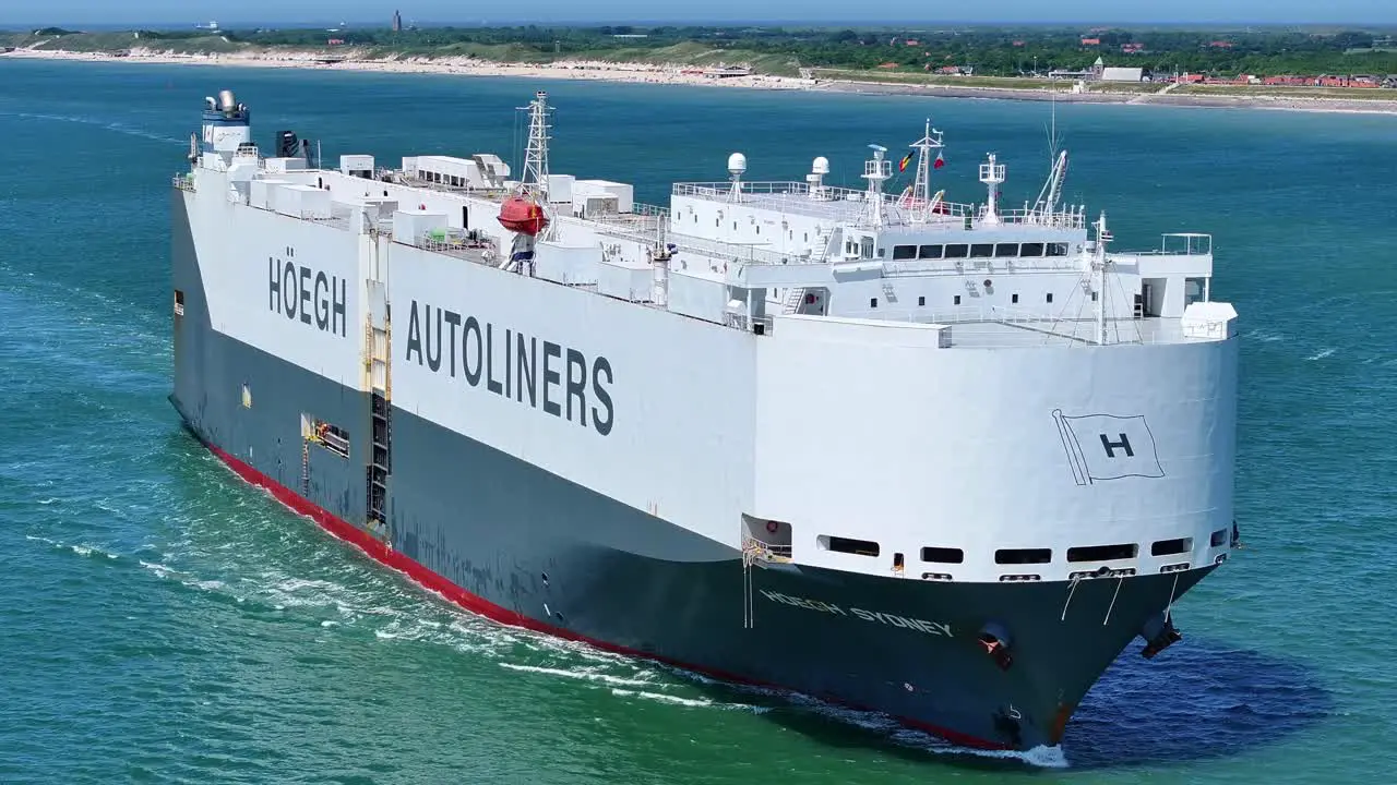 Massive and modern Höegh Autoliners ship carrying cargo around the Zouteland coast