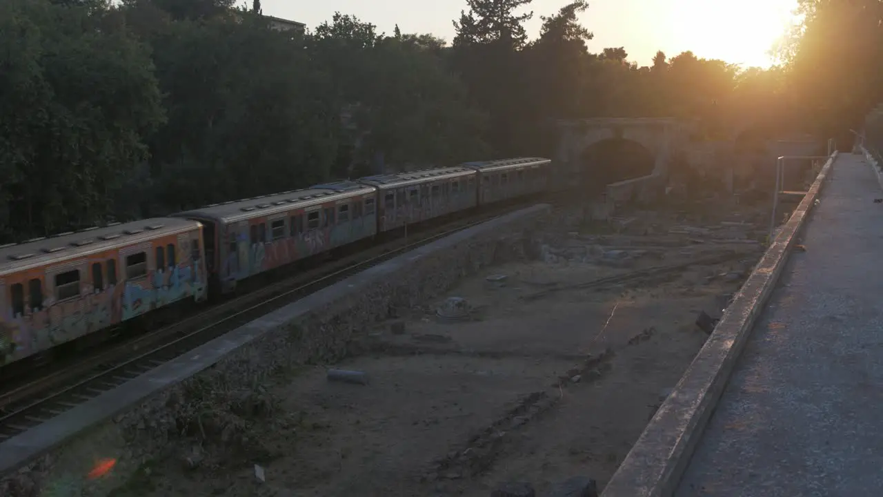 Metro train in Athens at sunset