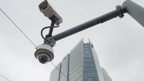 CCTV Cameras At Tram Station Stop Platform By Office Buildings In Birmingham UK