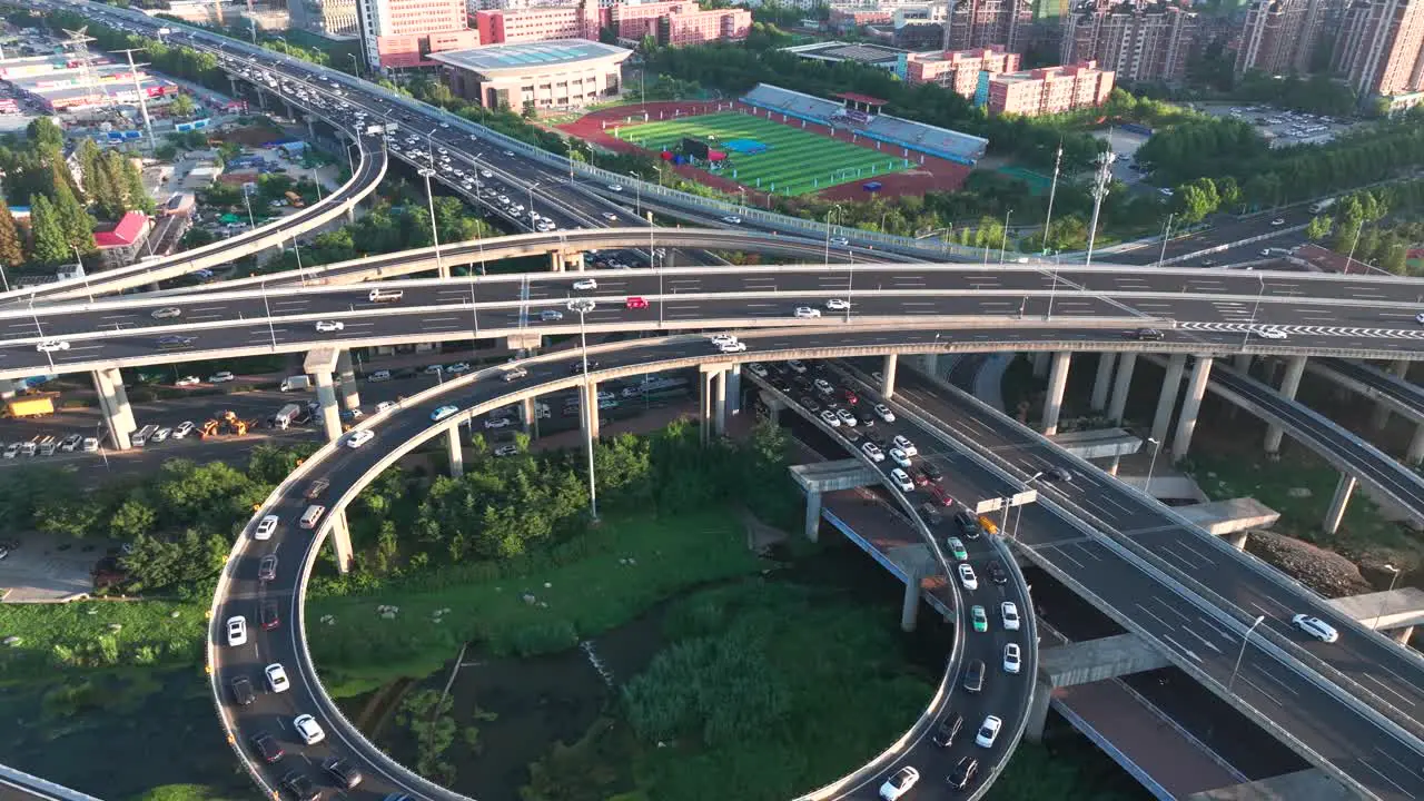 Aerial photography of urban transportation roads， Aerial vehicle driving on urban overpass