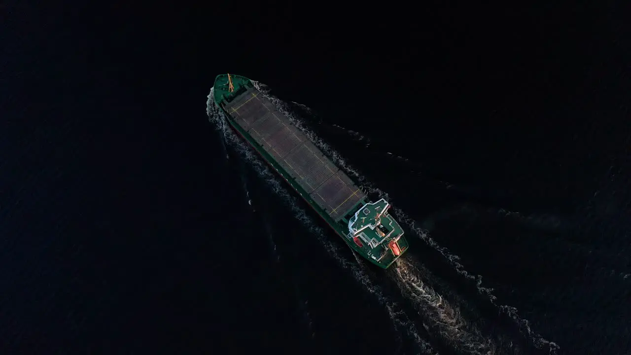 Top down aerial drone shot of empty cargo ship