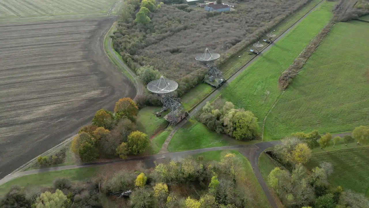 Aerial establishing shot of the antenna array at the Mullard Radio Astronomy Observatory a one-mile radio telescope