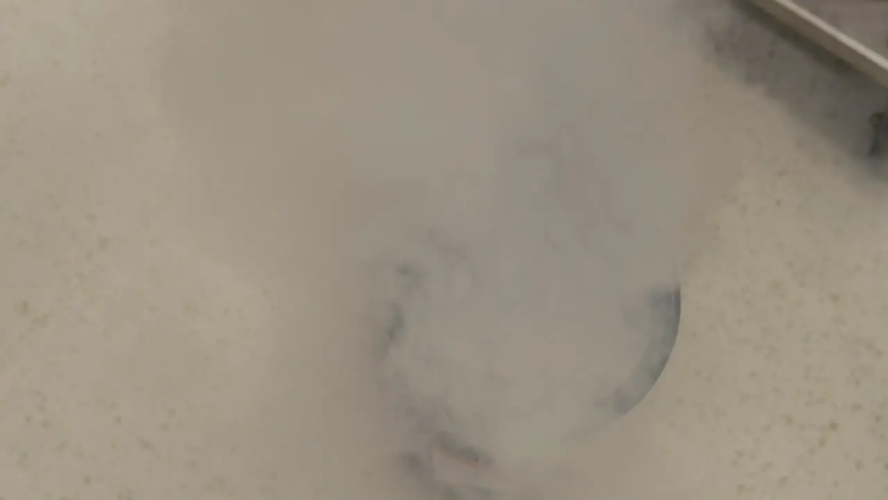 Formation of Vapor During the Transfer of Liquid Nitrogen from a Storage Tank to a Dewar Close Up