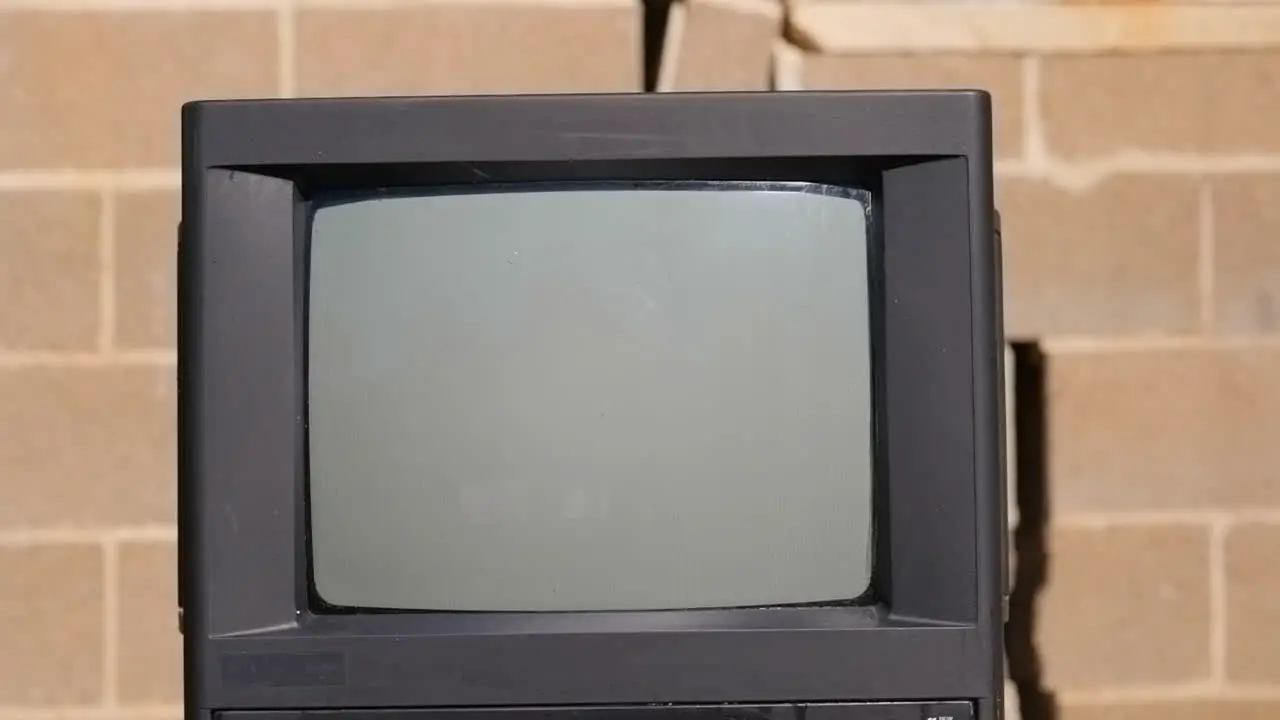 Water Poured Over Old TV