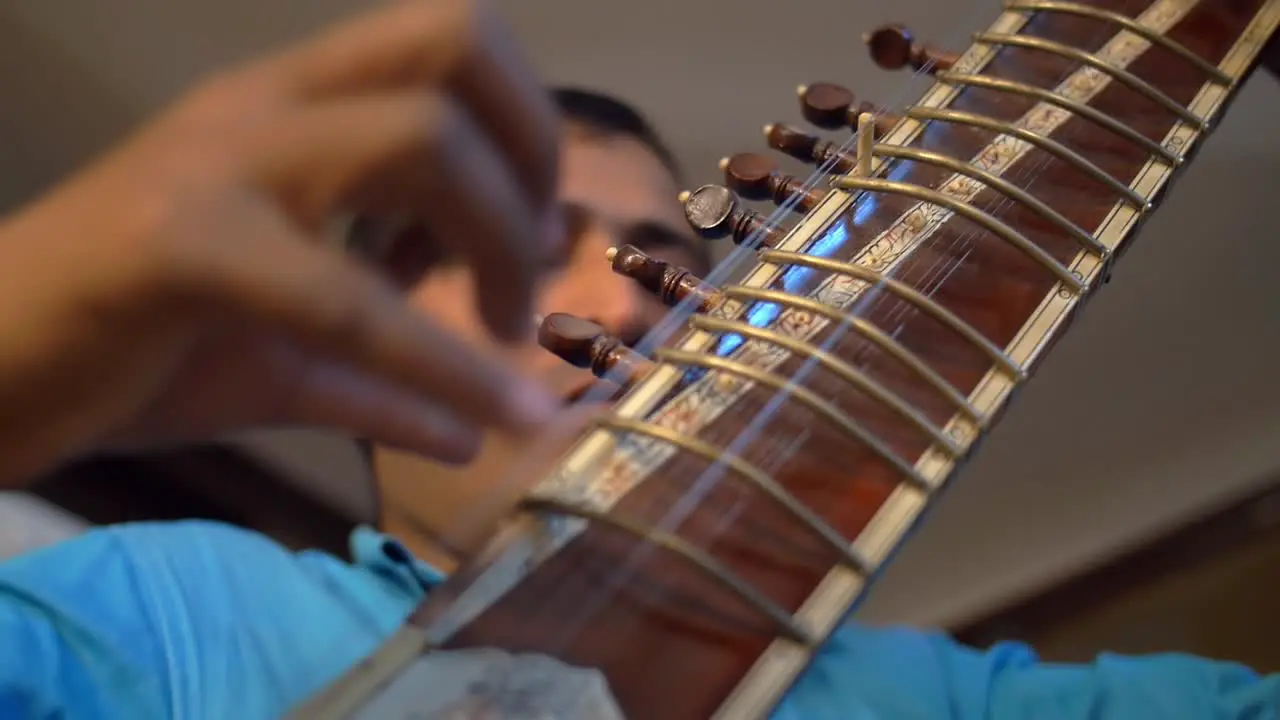 Man Playing Sitar