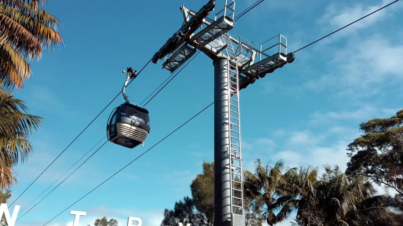 Single Cable Car with a Clear Blue Sky on a Sunny Day