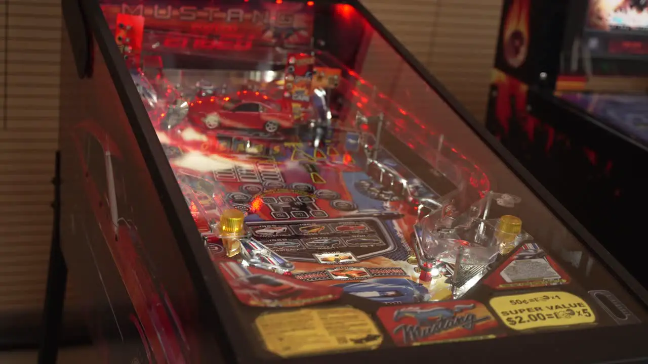 Girl Leaving Pinballl Machine at Costa Rica Connecturday Convention