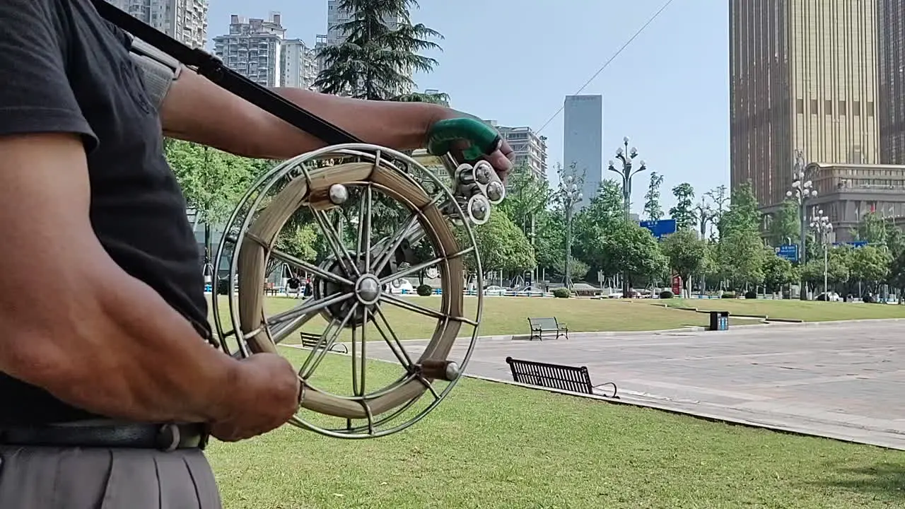 The kite line that is flying a kite is spinning