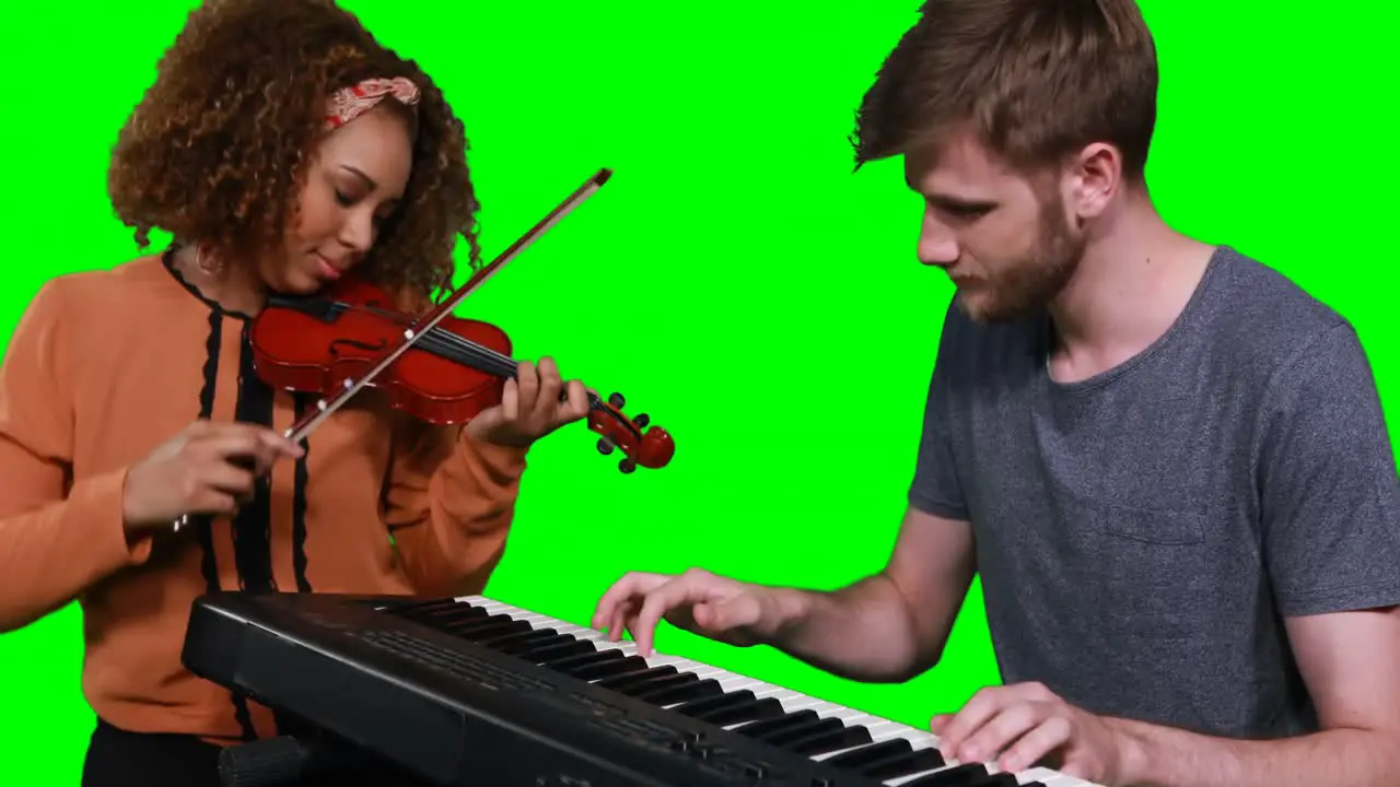 Musicians playing piano and violin