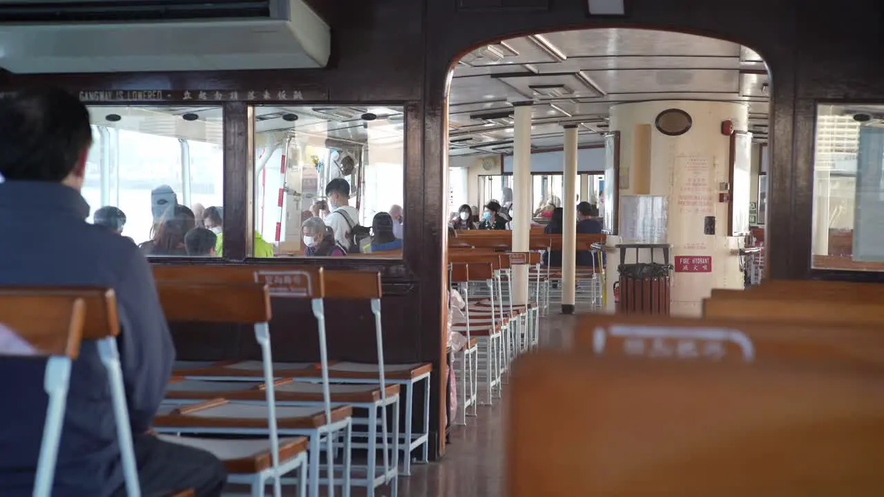 Passengers on a ferry in Hong Kong