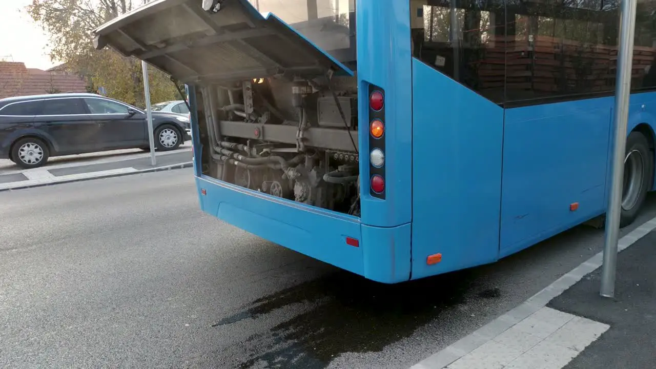 Broken down public transport bus with an overheated engine