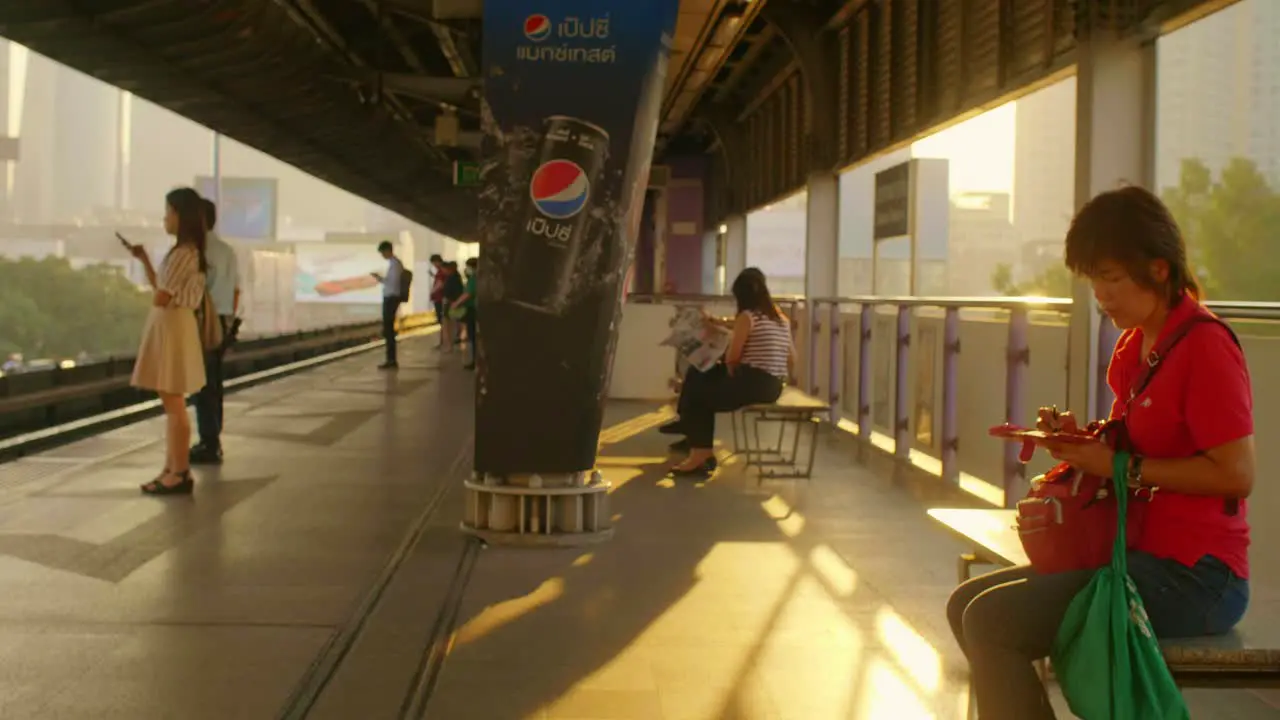 Passengers Waiting on Train Platform