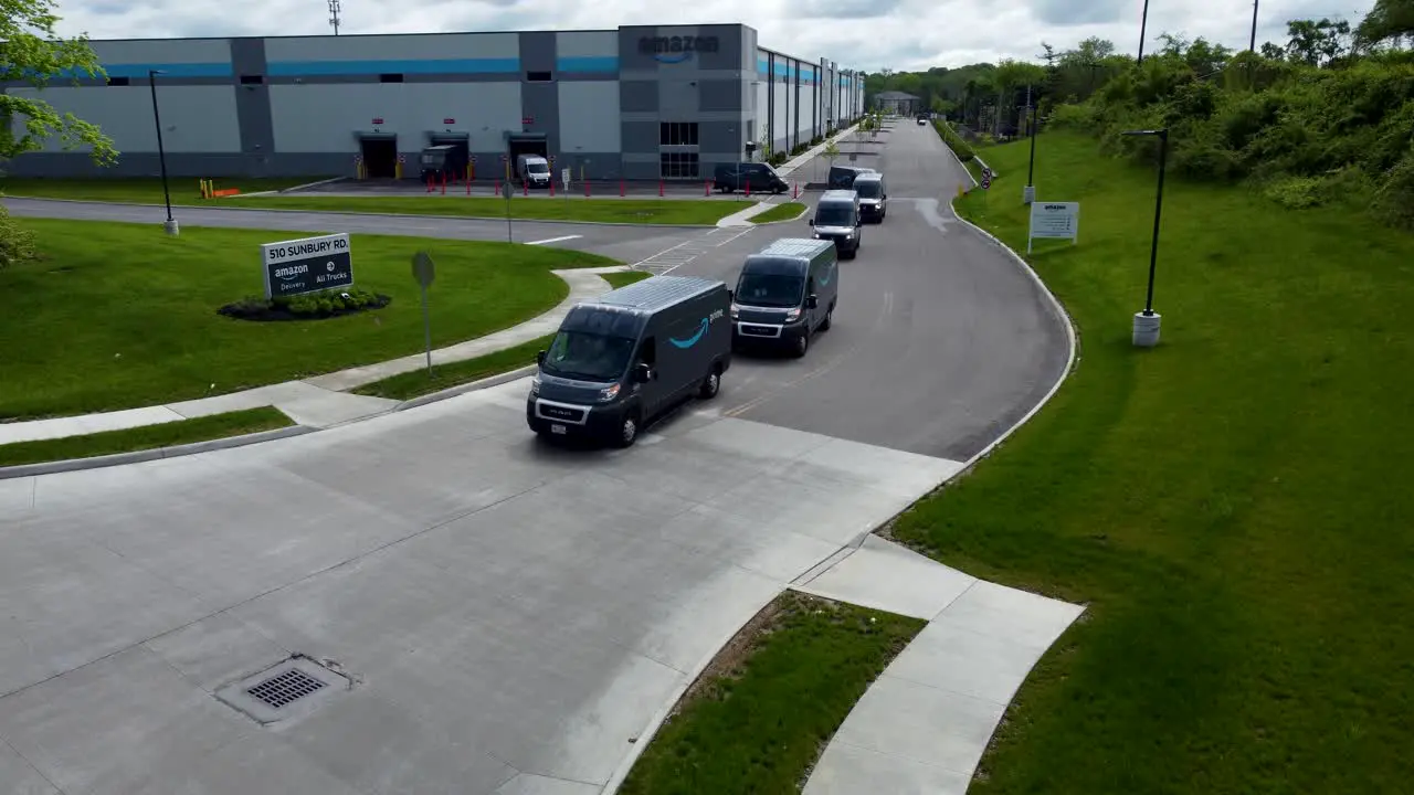 Amazon Trucks leave warehouse for deliveries