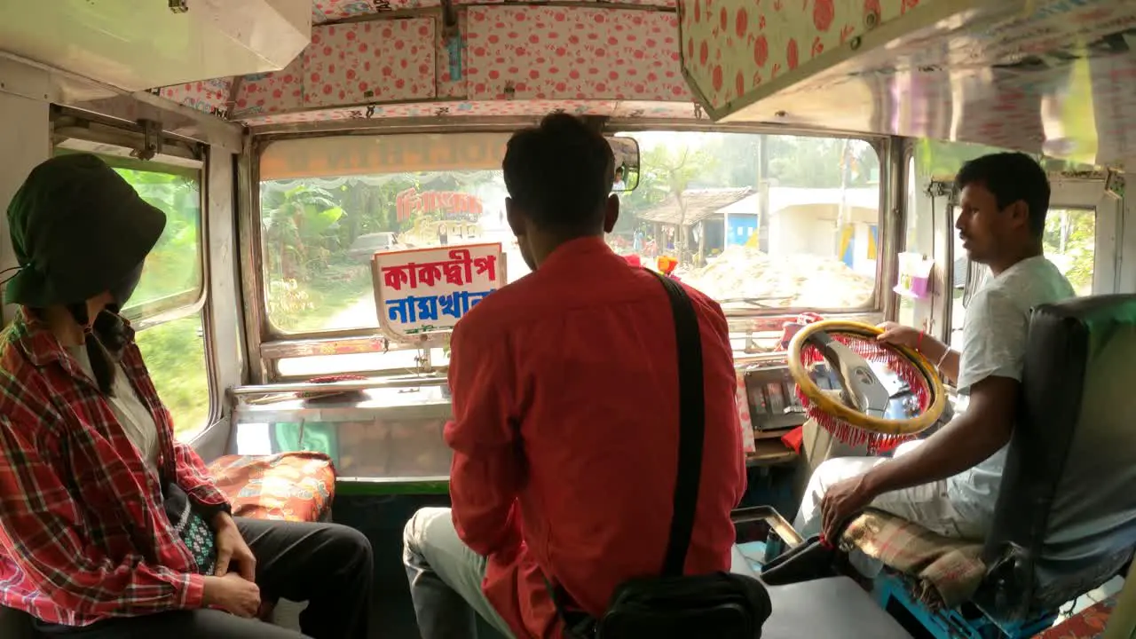 Traveling in a very colorful local private bus in India