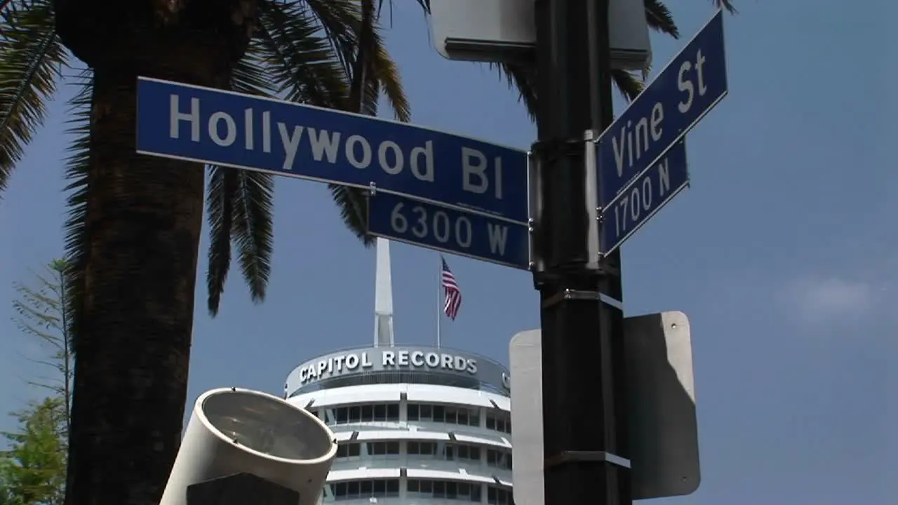 The Capitol Record building rises near the intersection of Hollywood and Vine